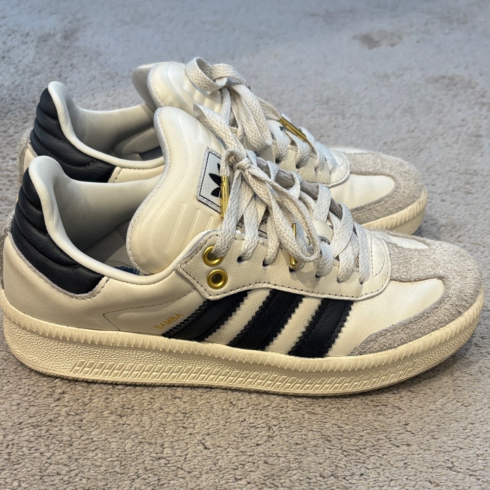 Adidas White and Black Sneakers with Gold Accents